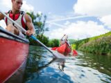 photo of man and woman on kayak paddlings