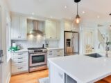 white wooden kitchen cabinet and white kitchen counter